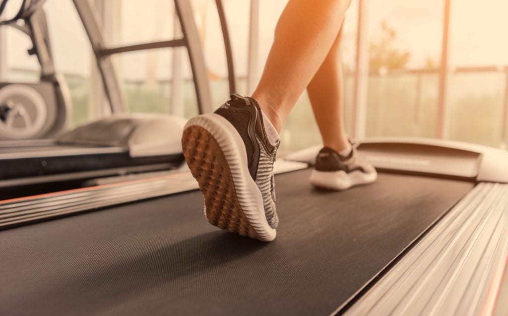 Woman Walking on Treadmill cellulite